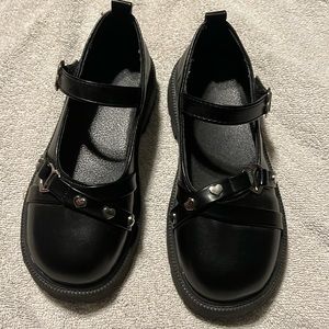 Girls black Mary Jane shoes. Size 2
